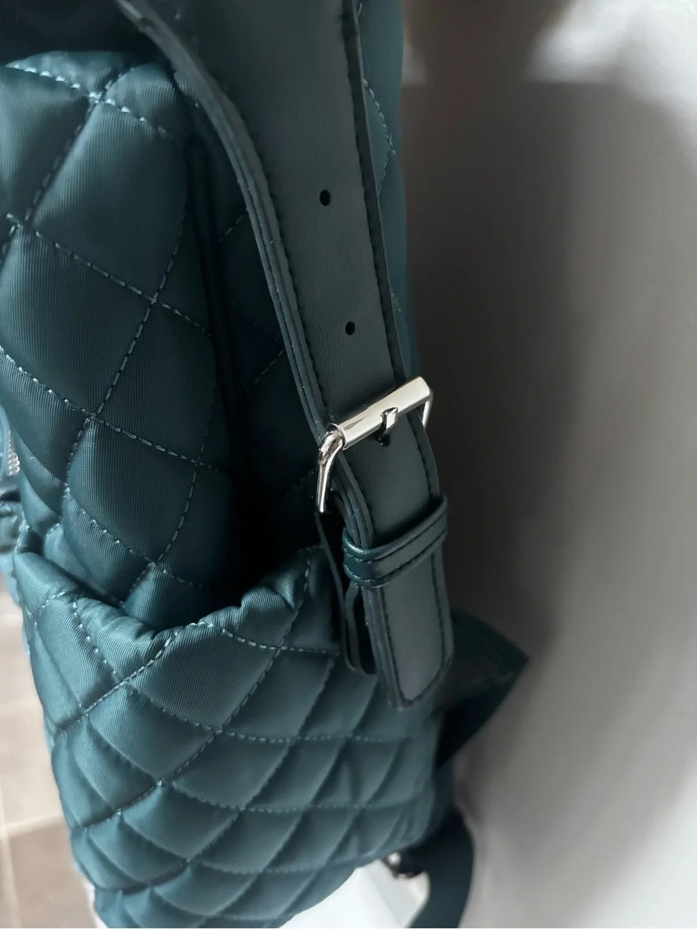 Tommy Bahama Day Trip Quilted Backpack in teal.